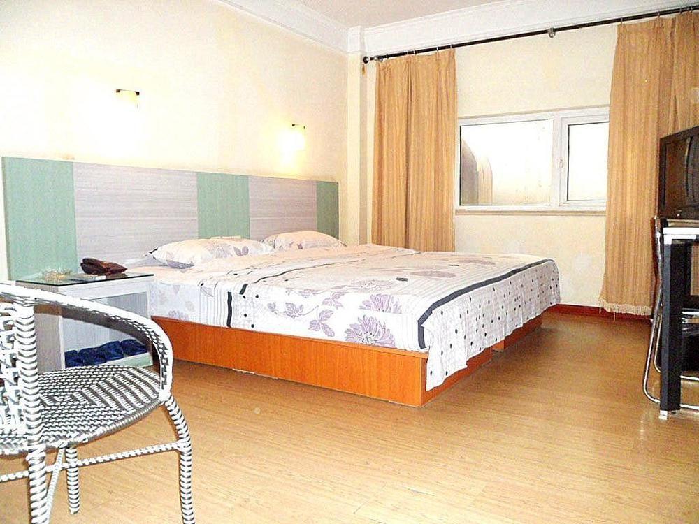 Jinkailai Business Hotel Qingdao Beer Street Екстер'єр фото